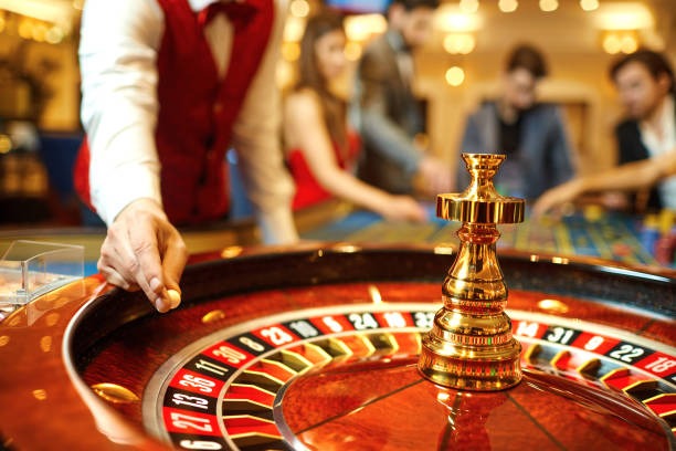 Caishen Wins live dealer table interface showing card layout and betting options